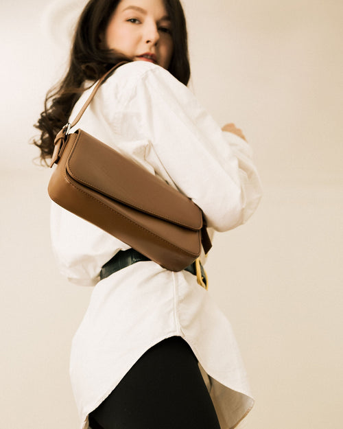 Baguette Bag worn by model in white shirt and black trousers