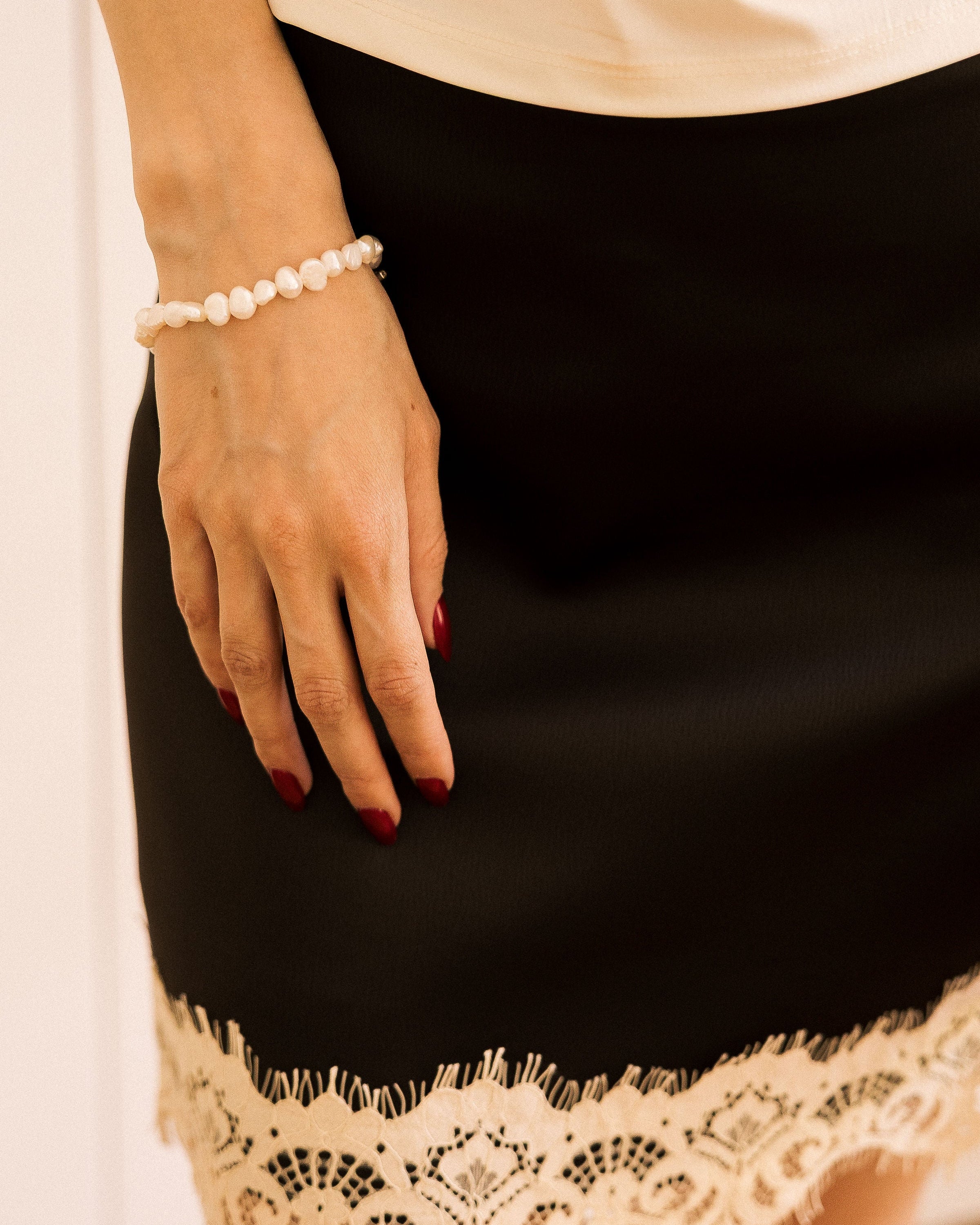 Freshwater Pearl Bracelet worn by model in cream lace top with pearl necklace