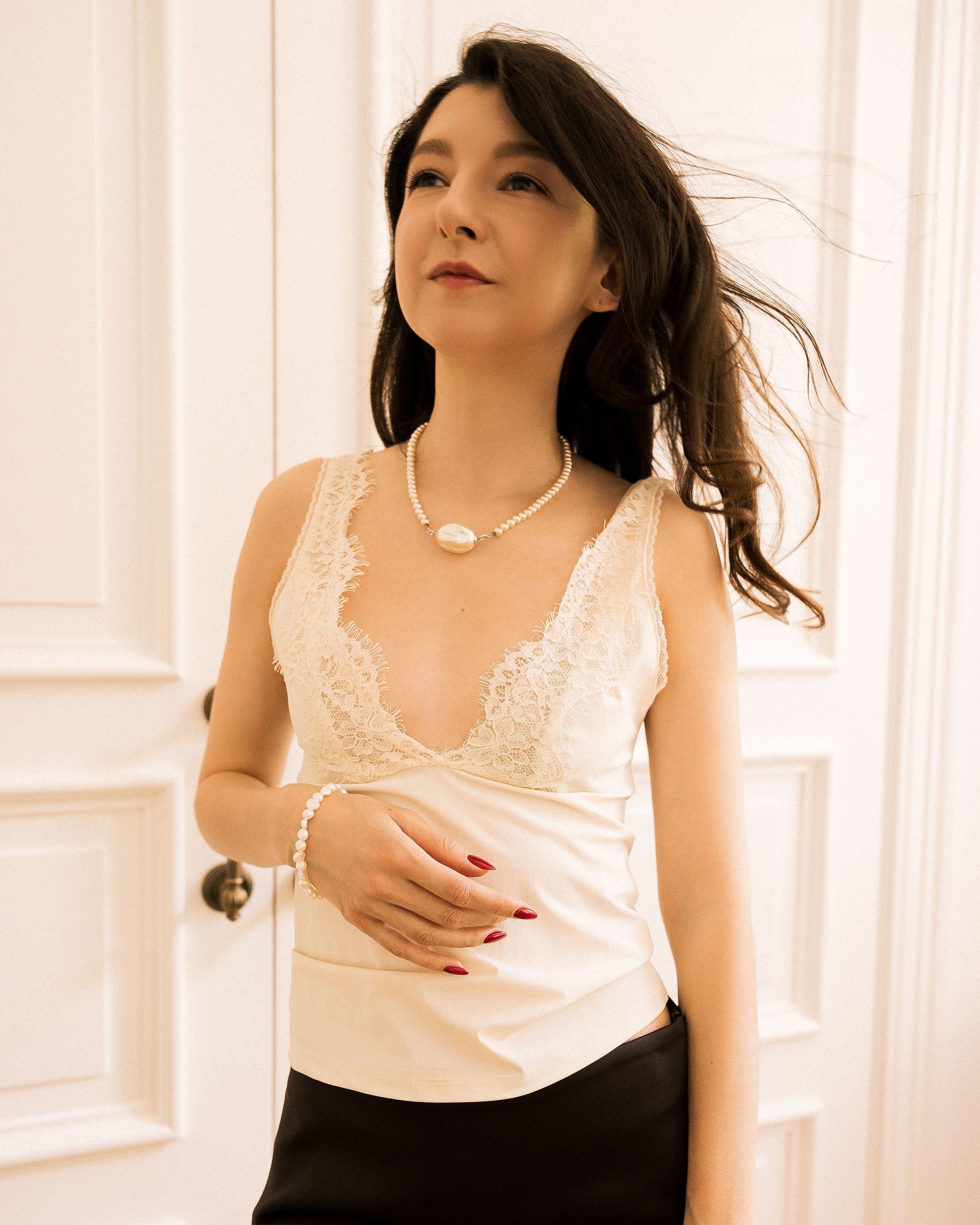 Freshwater Pearl Bracelet and necklace in white porcelain cup on gold tray