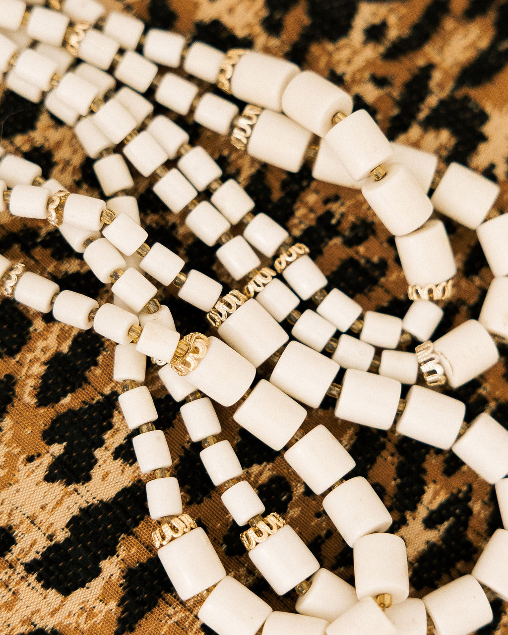 Vintage Japanese Beaded Choker detail shot on leopard print fabric